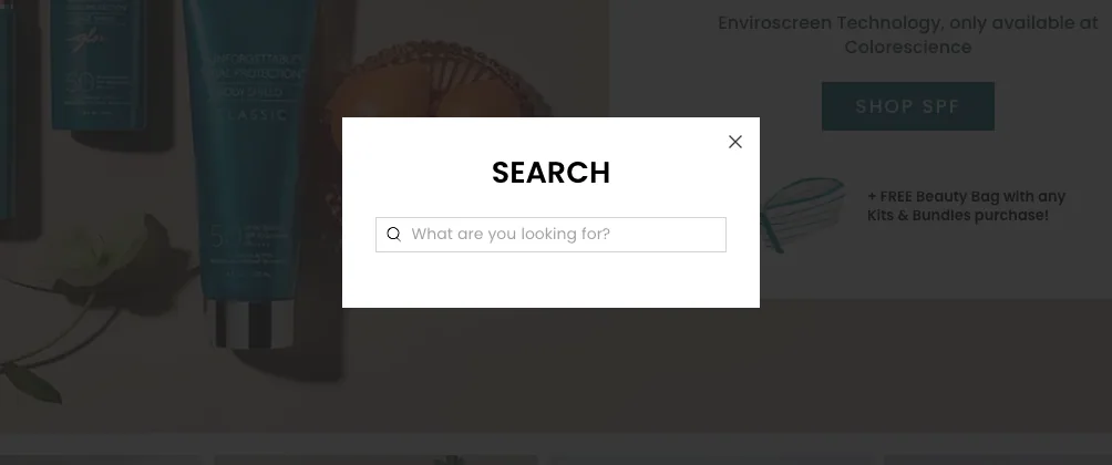 The old search modal over a dimmed homepage